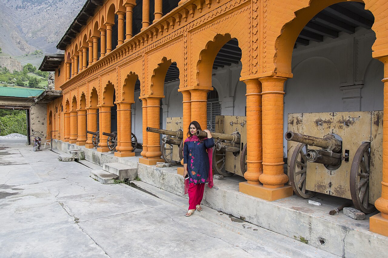 Arcaded courtyard and a displayed cannon inside Chitral Fort, 2016.