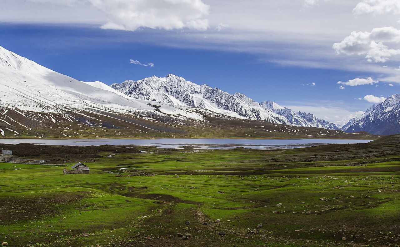 Snow-covered mountains above Shandur Lake and meadows, May 2016.
