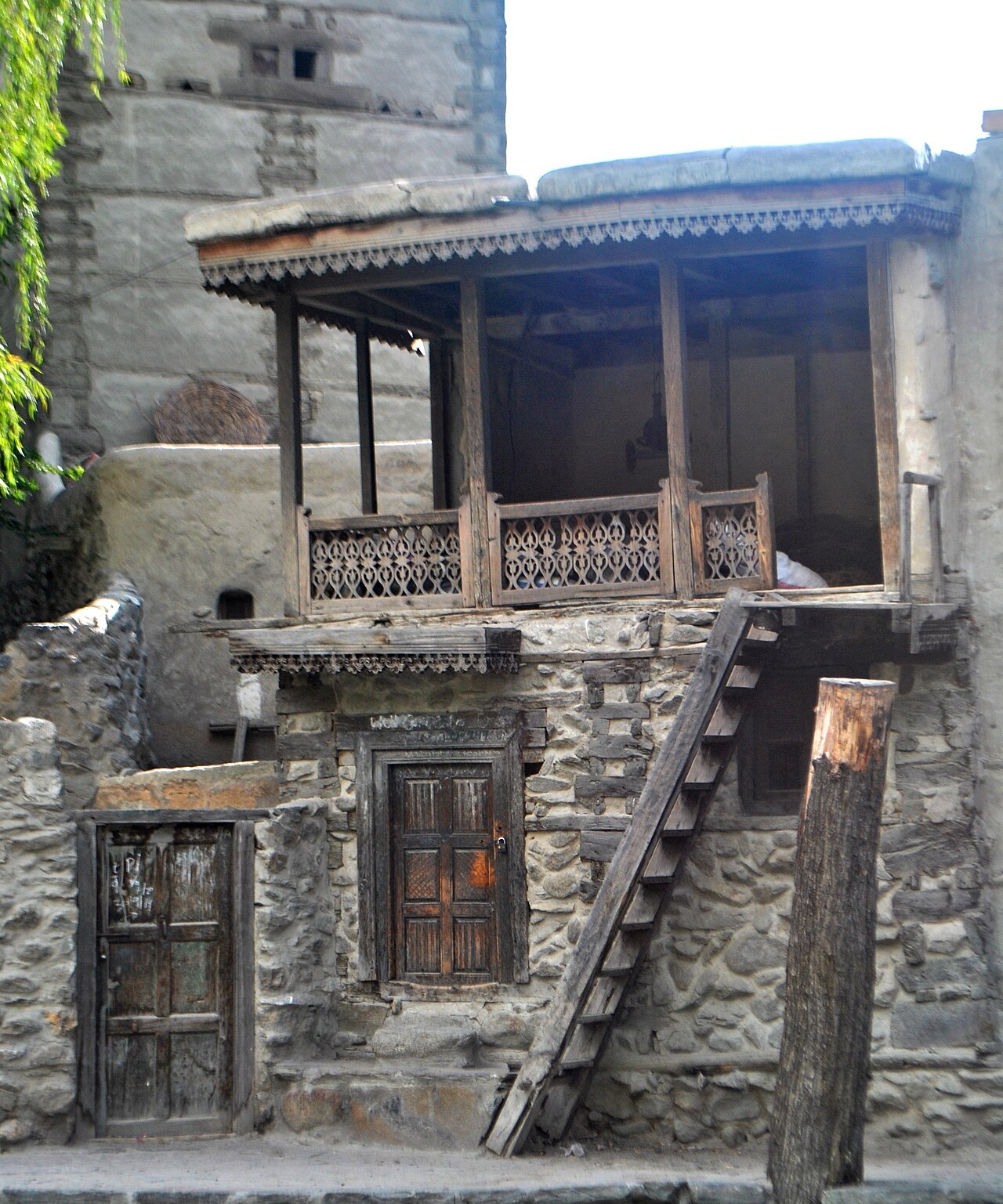 An old house with a wooden veranda in Ganish village, October 2014.